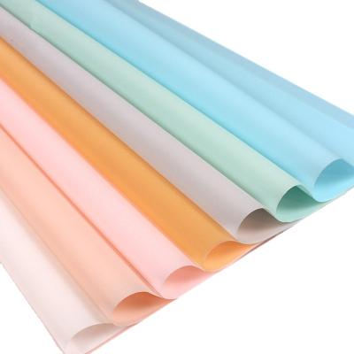 China Recyclable Korean Pure Translucent Waterproof Fog Flower Color Wrapping Paper Flower Paper Manufacturers for sale