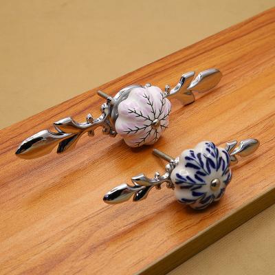 China Traditional Handles Pattern Modern Ceramic Round Metal Wardrobe Pull Window Drawer Buffet Furniture Knobs China Handles for sale