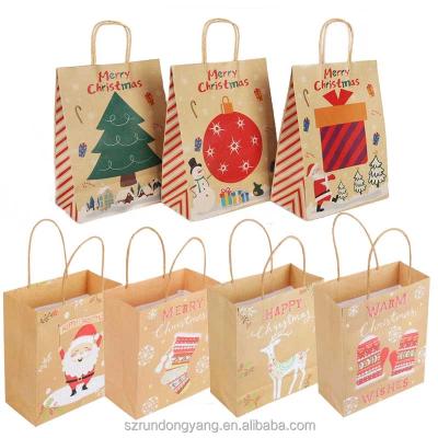 China New Year Christmas Santa Claus Pattern Gift Paper Bag Recyclable Candy Bag With Handles Custom Gift Kraft Paper Bags for sale