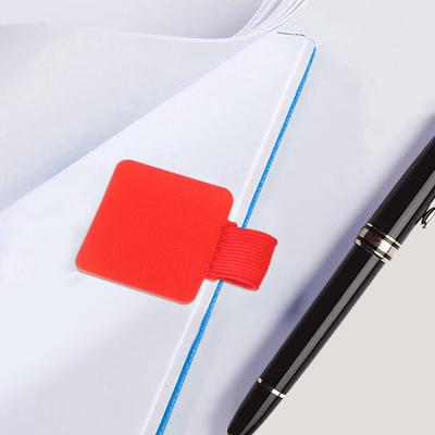 China Sticked a Promotional Notebook Pen Clip Loop Holder Self Elastic Leather Pen Loop Adhesive Pen Gift for sale