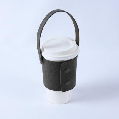 China Customized Viable Portable Mug Cover With Handle Reusable Faux Leather Coffee Mug Sleeve Holder for sale