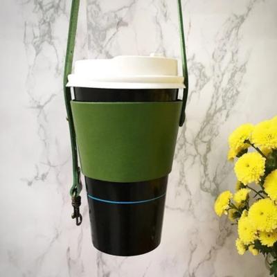 China Durable Hot Disposable PU Leather Gift Handle Headed Mug Cover Reusable Leather Coffee Mug Sleeve Holder for sale