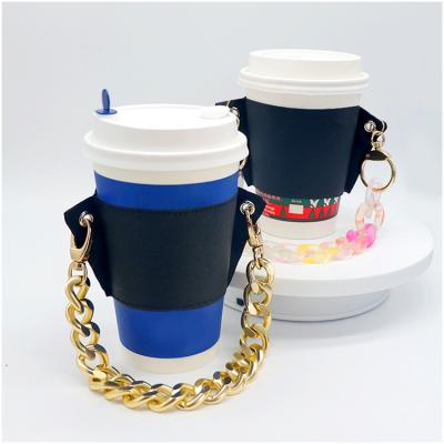 China Viable Custom Logo Printing Cold Handle Cup Cover Sleeve Leather Coffee Cup Sleeve Holder for sale