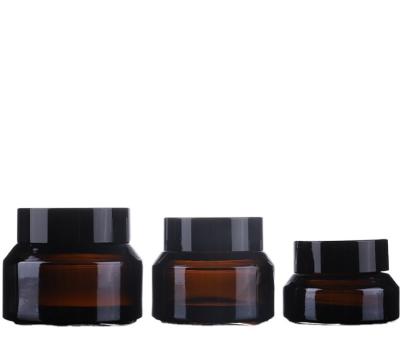 China Cosmetic Glass Oblique Eye Shoulder Cream Jar Cosmetic Skin Care Cream Container for sale