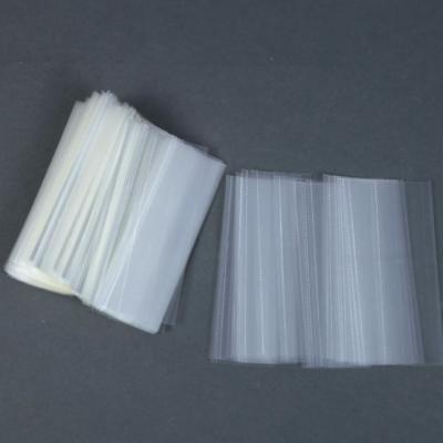 China Clear Moisture Proof Shrink Wrap Seal Tapes With Perforation Lines, Hot PVC Shrink Tape With Easy Tear Line for sale