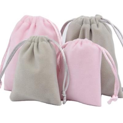 China Easy carry and shear small jewelry pouch rose velvet fiber fabric soft materical drawstring bag for wedding for sale