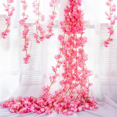 China High Simulation Price Wedding Decoration Cheap Indoor Flower Vines Artificial Leafless Cherry Blossom Vine Wedding Flowers for sale