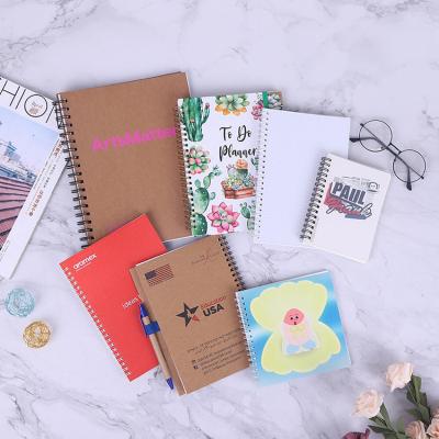 China Spiral wholesale office and school cheap bulk spiral notebook a5 a6 for sale