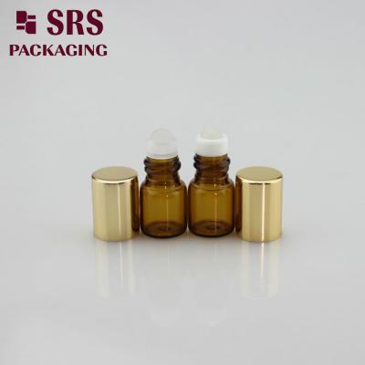 China SRS empty 1ml amber mini glass sample roll on bottle with gold aluminum cap for sale