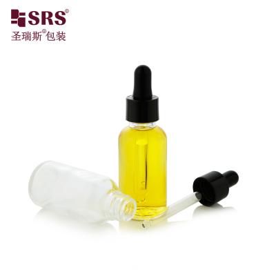 China Facial Serum Glass Essential Oil Bottle Clear With Dropper for sale