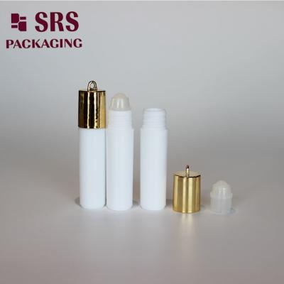 China SRS empty cosmetic 5ml plastic perfume roll on bottle with gold hook cap for sale