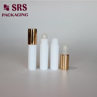 China SRS empty cosmetic 5ml white plastic roller bottle with gold aluminum cap for sale