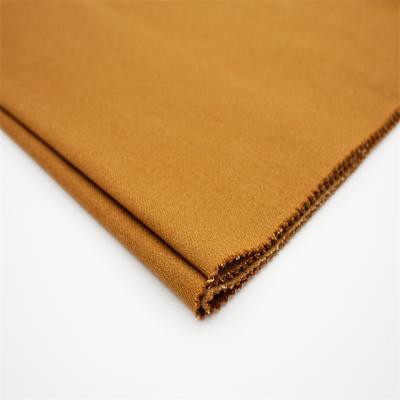 China Autumn and winter men's jacket pants cotton polyester casual stretch bamboo yarn repellent yellow and brown card fabric for sale