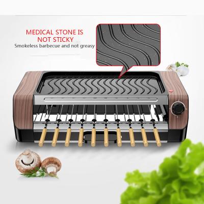 China 220V Household Height Adjustable Multifunctional Smokeless BBQ Grill Electric Automatic Rotating Skewers Electric Artifact for sale