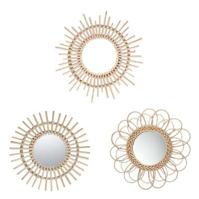 China Luminous Sun Shape Innovative Wall Hanging Bathroom Art Decoration Round Makeup Mirror Decorative Mirror Rattan for sale