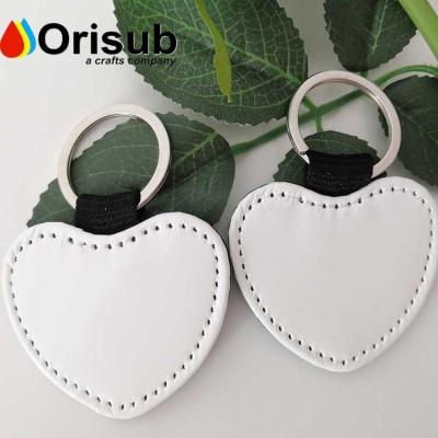 China Blank For 53x50mm Luxury Heart Shaped Sublimation Leather Photo Key Chain for sale