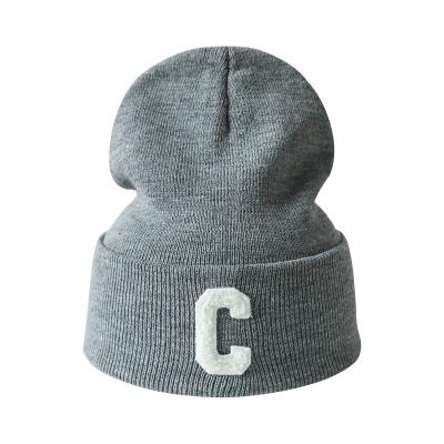 China COMMON Made Custom 100% Cotton Acrylic Embroidery Cuffed Hat Winter Knitted Beanies Warm Sport Adult Hat for sale