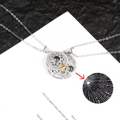 China CLASSIC 100 Languages ​​Projection Sun Moon Couples Necklace Clavicle Necklace I Love You Moon Embrace Sun Magnetic Simple Best Friend for sale