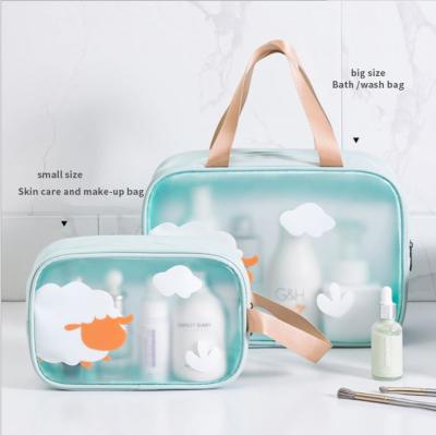 China Fashion PVC Custom Transparent Printed Cosmetics Storage Bag For Outdoor Beach Travel Zipper Toiletry Bag For Women for sale