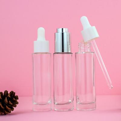 China 10ml graduated cosmetic wholesale glass pipette 30ml 50ml 60ml 100ml 120ml for essential oil dropper glass bottle for sale