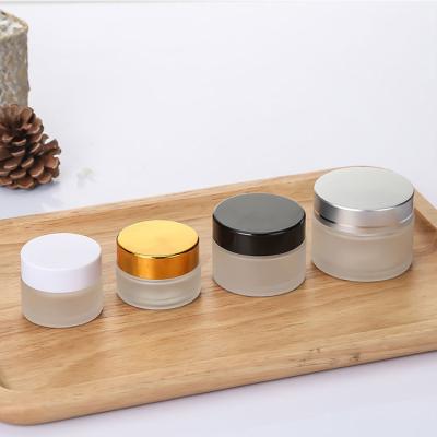 China Round Mouth Cosmetic Bamboo Wide Glass Jar Lid Cosmetic Jar for sale