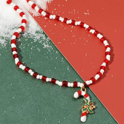 China FASHIONABLE Christmas Red Enamel Beads Crutch Gold Plated Christmas Necklace Rice Pendant Necklace for sale