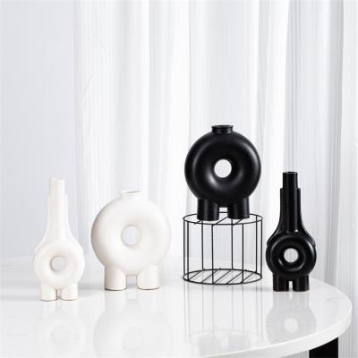 China Modern Single Donut Table Nordic Matte White and Black Porcelain Ceramic Flower Vase Decoration for Home Decor for sale