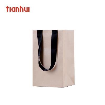 China Biodegradable Reusable Shopping Wedding Handbag Gift Packaging Paper Bags for sale