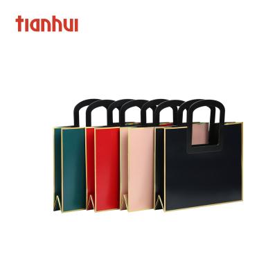 China Customized Brand Elegant Rectangle China Competitive Price Logo Luxury Shopping Gift Bags With Handles for sale