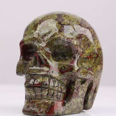 China Wholesale Natural China Dragon Blood Stone Quartz Crystal Skulls For Sale for sale