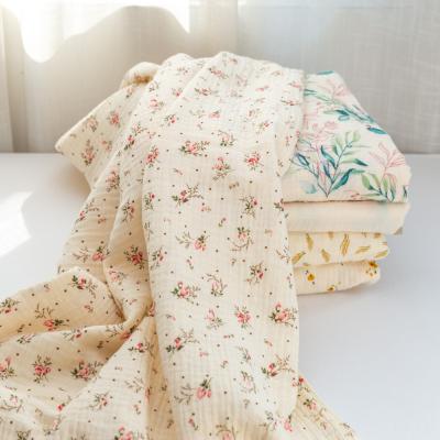 China Low Moq Eco Friendly Small Flower Printing Cotton Gauze Double Muslin Wholesale Covering Fabric for sale