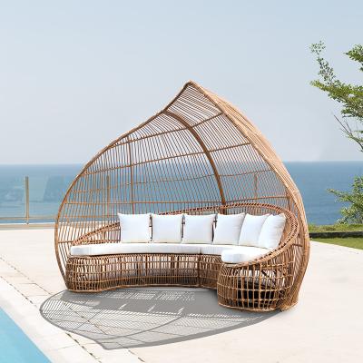 China Modern Round Peach Shape Aluminum Alloy Folding Bed With Sponge Cushion Patio Furniture Luxurious Wicker Lounger for sale