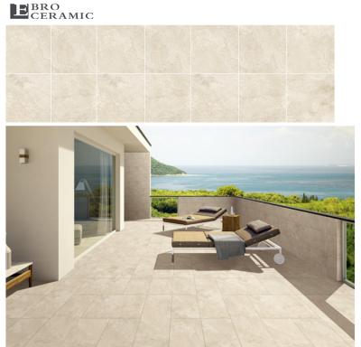 China Travertine Full Body Anti Slip Tiles 24x24 Tone Balcony Patio Garden Porcelain Floor Tiles Rustic Beige Stone Look for sale