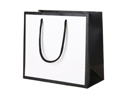 China Handmade Free Sample Printing Custom Matte Black Apparel Paper Shopping Bag with Rope Handle for Pharmacy T-shirt Shoes Bottle Packaging for sale