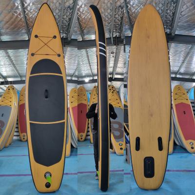 China Popular custom made good quality hot sale paddleboards unisex surfing paddle board inflatable cheap surfboards sip wooden grain for sale