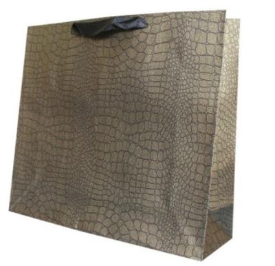 China Wholesale Disposable Luxury Gold Embossed Custom Paper Gift Shopping Bag for sale