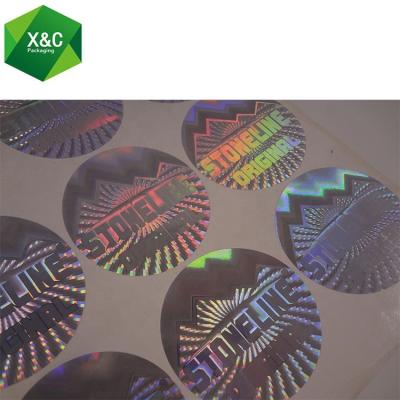 China Holographic Cheapest Round Tamper Logo Hologram Stickers Customized Visible for sale