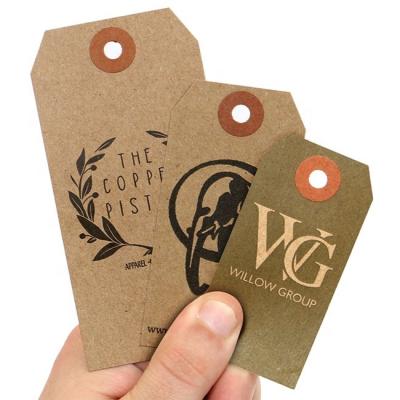 China Sustainable Recycled Blank Kraft Custom Folded Gift Clothes Hang Tags With String And Safety Pin for sale