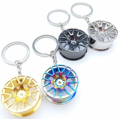 China Factory wholesale car key accessories eco-friendly roll key chain tire rim 3d metal key chain for sale