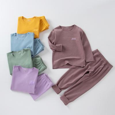 China Hot-sale Children's Breathable Cotton Pajamas Set , Solid Color Long Sleeve Warm Home Pajamas for sale