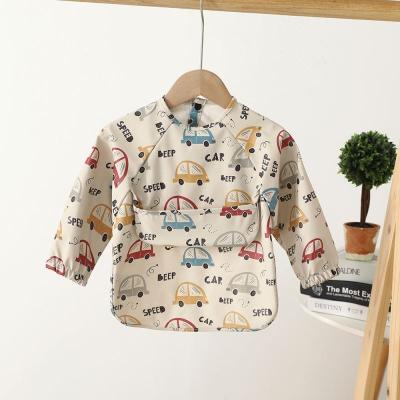 China Modern Design Washable Cloth Long Lasting Newborn Cartoon Sleeved Bibs For Baby for sale