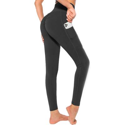 China Breathable High Waist Yoga Pants With Pockets Feeling Workout Gaiters TIK Tok Capri Butter Soft Naked For Women Gym Pants for sale