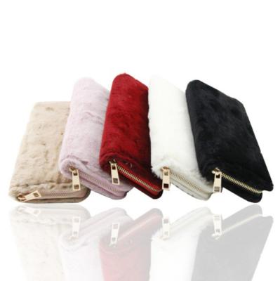 China Custom designer faux fur wallets multifunctional running furry women wallet bag RTS carteras designer faux fur wallets for women for sale