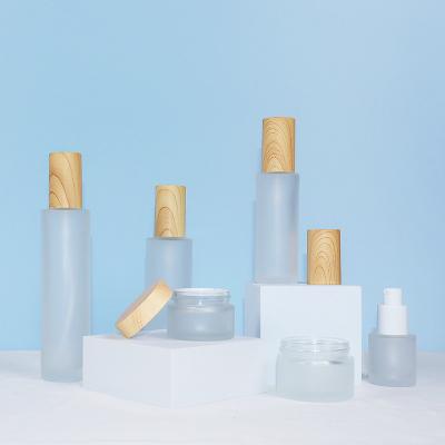 China New Cosmetic Luxury Cosmetic Packaging Jar Cream Container And Lotion Cosmetic Glass Pump Bottles Wholesale for sale