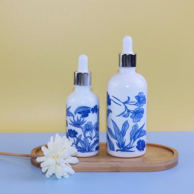 China 15ml 30ml 50ml 100ml Premium Blue White Porcelain Essential Oil Serum Oil Serum Glass Dropper Bottles Cosmetic Packaging for sale