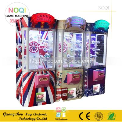 China Metal Frame NQG-01 Latest Design Gift Vending Machine Lucky Number Crane Claw Machine With Doll for sale