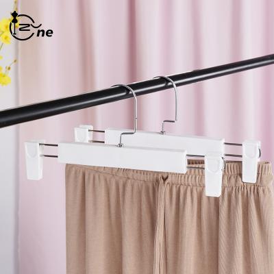 China Eco-friendly White Multi Functional Fashion Plastic Panty Hanger With Clips For Wardrobe Cabinet for sale