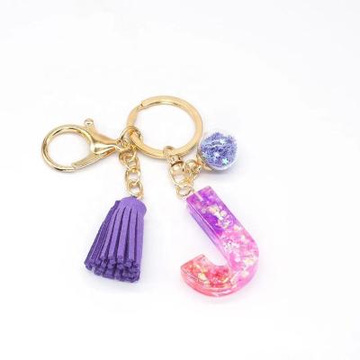 China New Design Resin Bling 26 Alphabet Tassel Wholesale Initial Letter Key Chain for sale