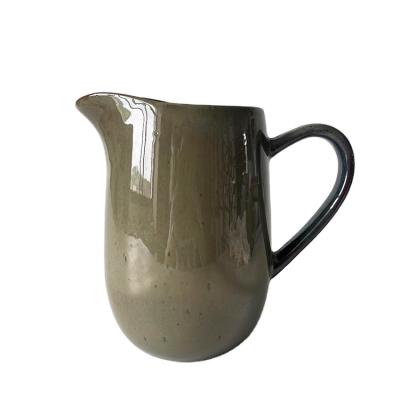 China Sustainable Upclay Stoneware Ceramic Nordic Collection Home Decor Reactive Hydro Water Pitcher Jug for sale