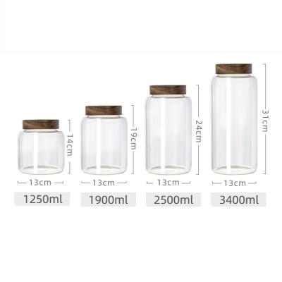 China Freshness Preservation Air Tight Food Jar Glass Storage Jar With Wooden Lid Kitchen Clear Glass Canister For Pantry Food Storage Jars Containers for sale